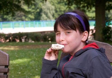 Girl eating ice cream clipart