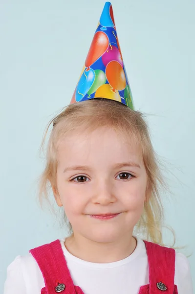 Chica con sombrero de cumpleaños —  Fotos de Stock
