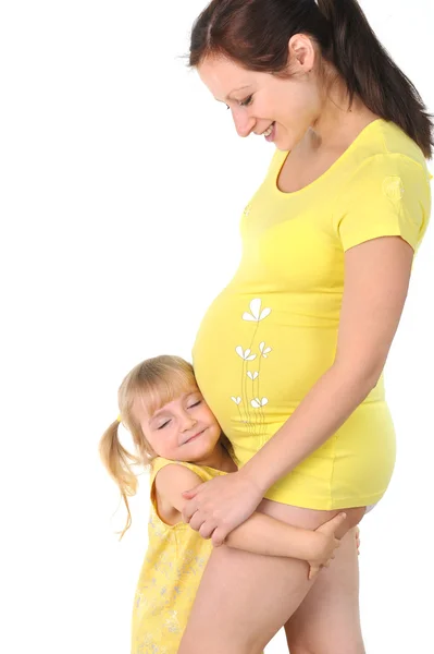 Dívka s těhotnou matkou — Stock fotografie