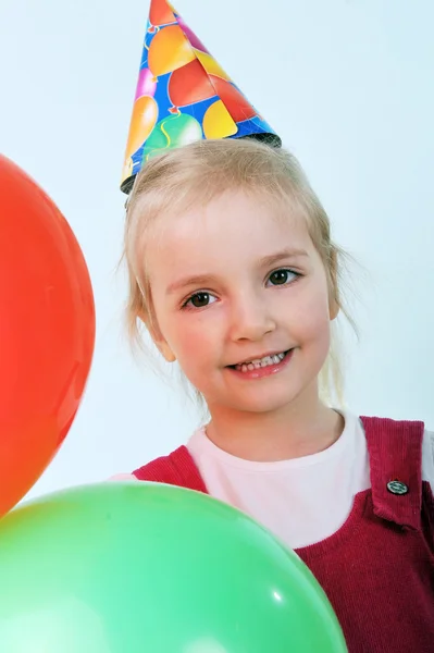 Girl with birthday hat — Stock Photo, Image