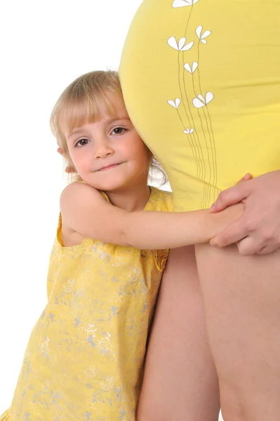 Girl with pregnant mother — Stock Photo, Image