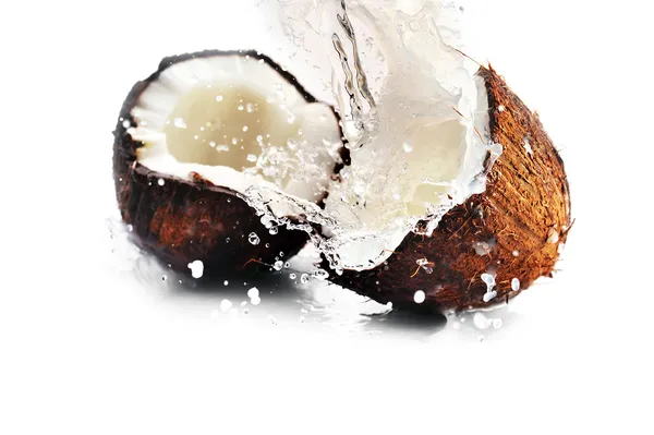 Knäckt kokos med stänk — Stockfoto