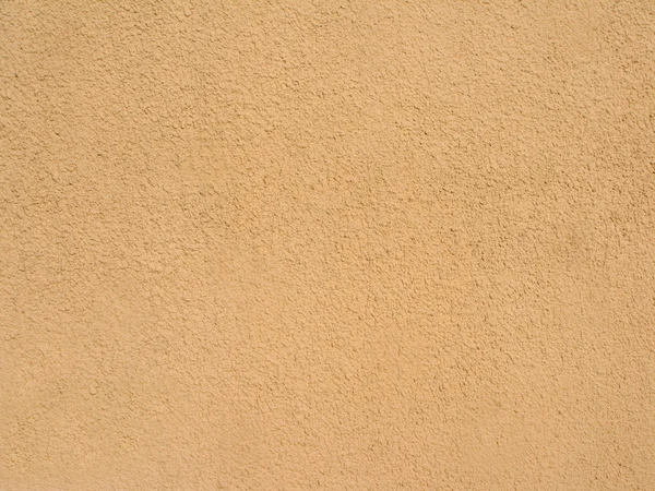 Abstract sandy brown plastered textured wall as background — Stock Photo, Image