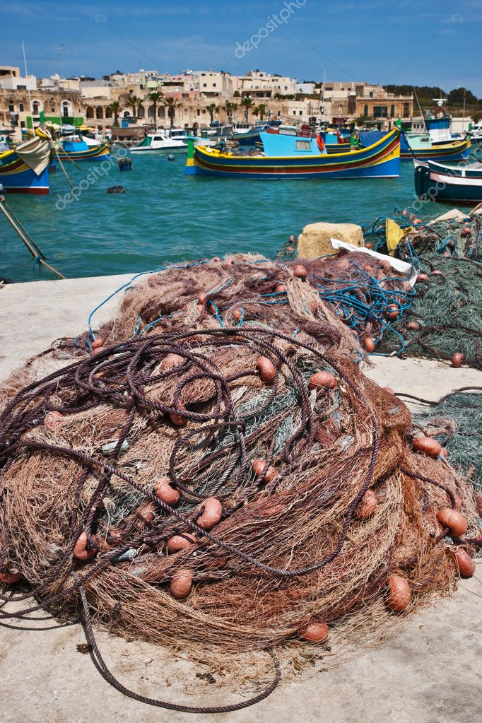 Fishing net in the fishing village Marsaxlokk, Malta Stock Photo