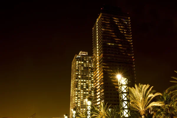 stock image Skyscraper in Barcelona at night