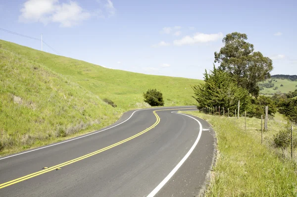 Hills and country road — Stock Photo, Image