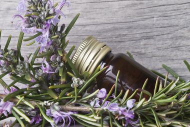 Jar with rosemary perfume. clipart