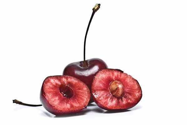 One cherry and one cut. — Stock Photo, Image