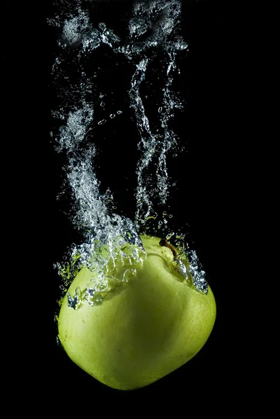 Golden apple splashing. — Stock Photo, Image