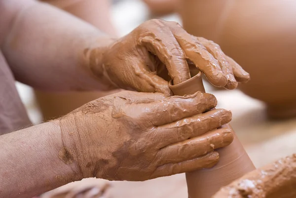 Hands and clay. — Stock Photo, Image