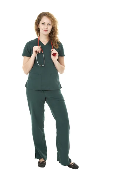 Junge hübsche Krankenschwester auf weiß — Stockfoto