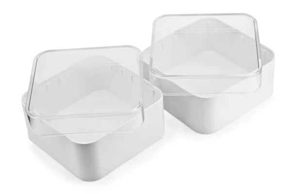 Petites boîtes isolées en plastique blanc — Photo
