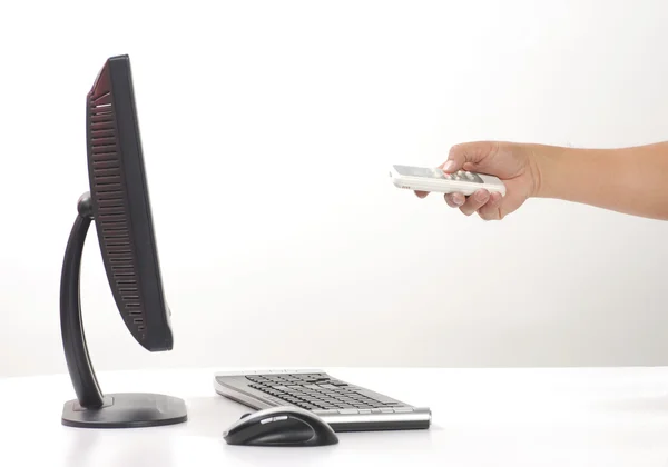 stock image Hand sticks out computer monitor