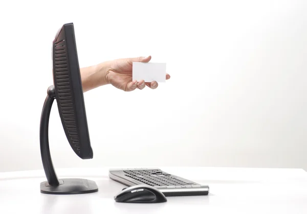 stock image Hand sticking out computer monitor