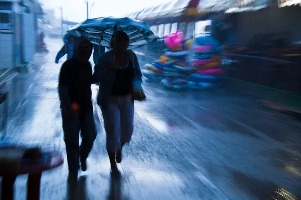 stock image rushing on the rainy street