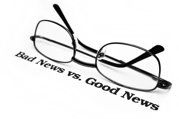 Bad news vs. good news — Stock Photo, Image