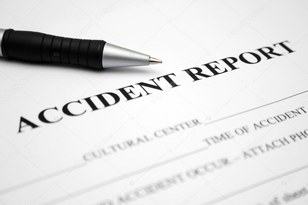 Accident report form with pen
