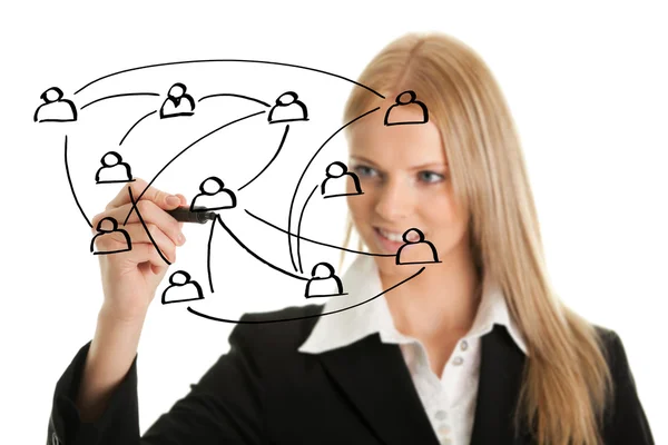 Empresária desenhando um gráfico de rede social — Fotografia de Stock