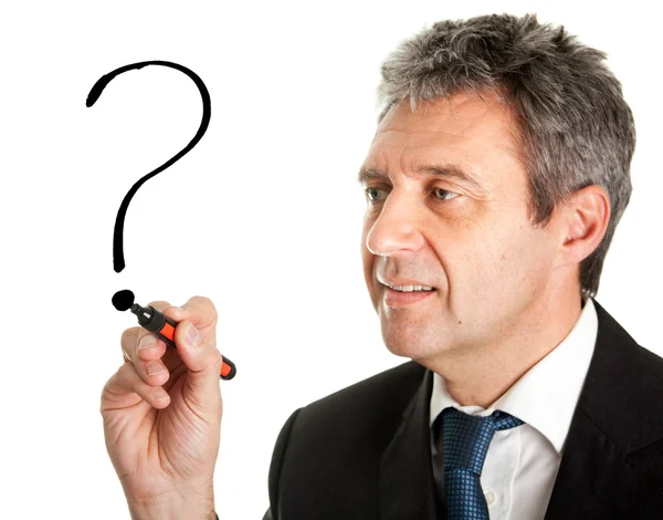 Businessman drawing a question mark — Stock Photo, Image