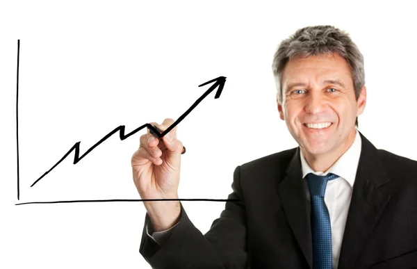 Empresário escrevendo um gráfico financeiro — Fotografia de Stock