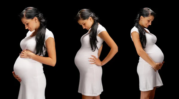 Těhotná na černém pozadí — Stock fotografie