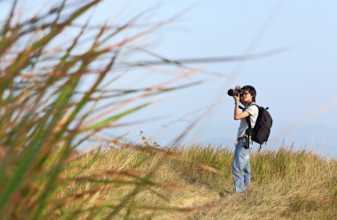 Photographer taking photo outdoor clipart