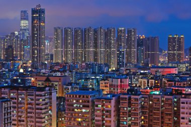 Apartment building at night clipart