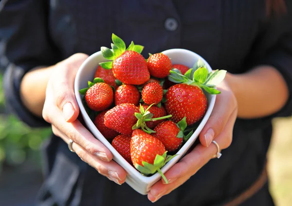 Strawberry in heart shape bowl — Stock Photo, Image