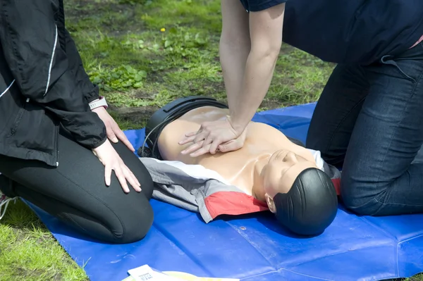 stock image Training to performance of artificial breath on a dummy.