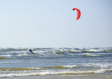 Jürmala (Latvia). Surfing with a parachute clipart