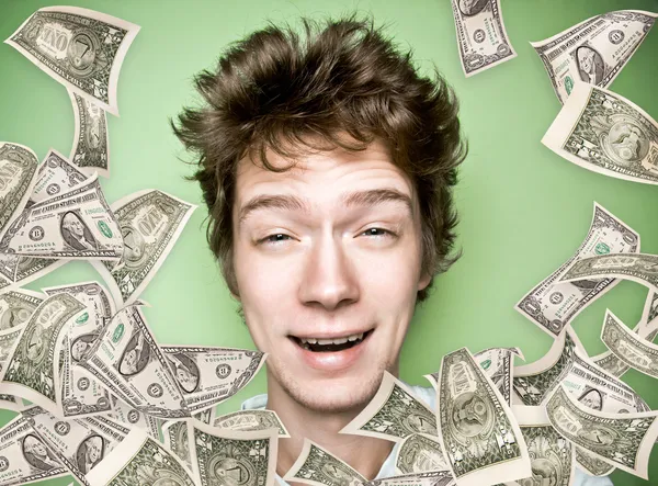 Closeup portrait of a young man with money rain — Stock Photo, Image