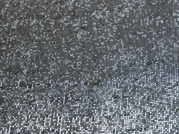 Muster von Kreisen aus silbernem Metall schimmern im Licht — Stockfoto