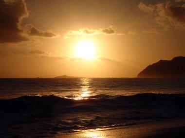 Sunrises over Rock Island by Maka'pua Point clipart
