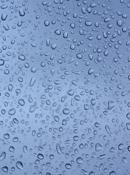 stock image Water droplets on window glass