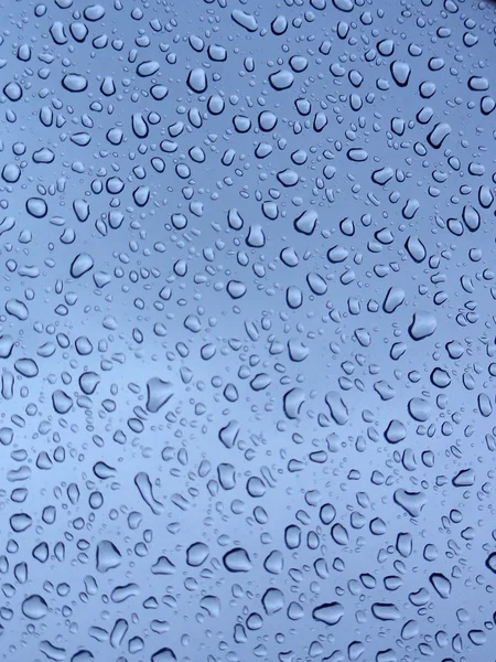 Wassertropfen auf Fensterglas — Stockfoto