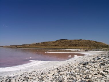 Old industrial site along the salty shore of the great Salt Lake clipart