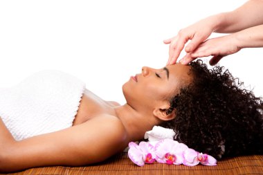 Facial massage in beauty spa clipart