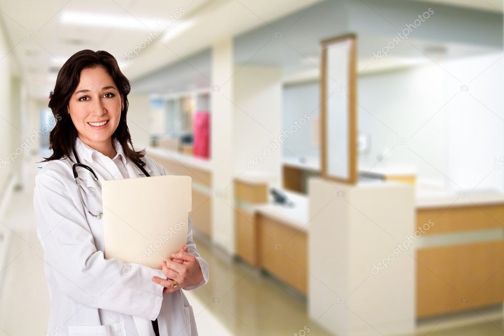 Happy Doctor with patient chart file dossier in hospital