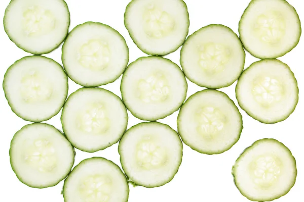 Komkommer plakjes arrranged in een patroon. — Stockfoto