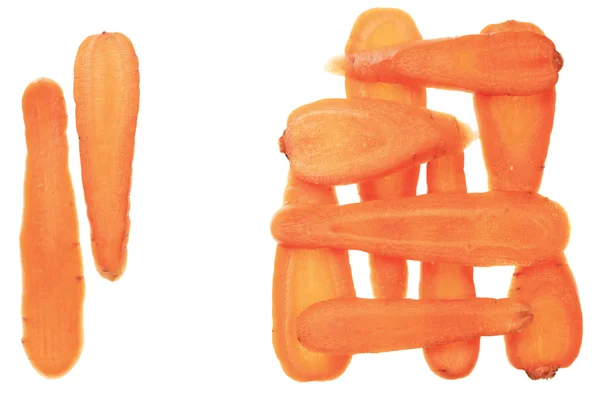 Carrot slices arrranged in a pattern. — Stock Photo, Image