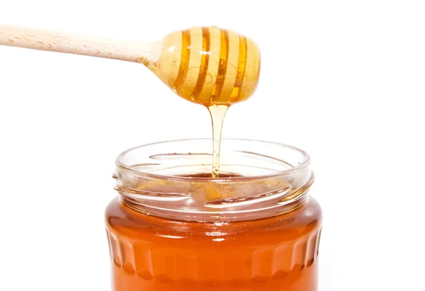 Med v dřevěnou hůl — Stock fotografie