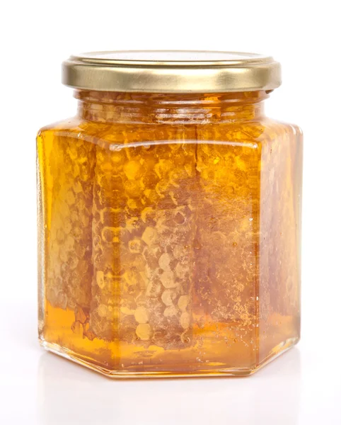 하얀 배경에 있는 꿀단지 — 스톡 사진