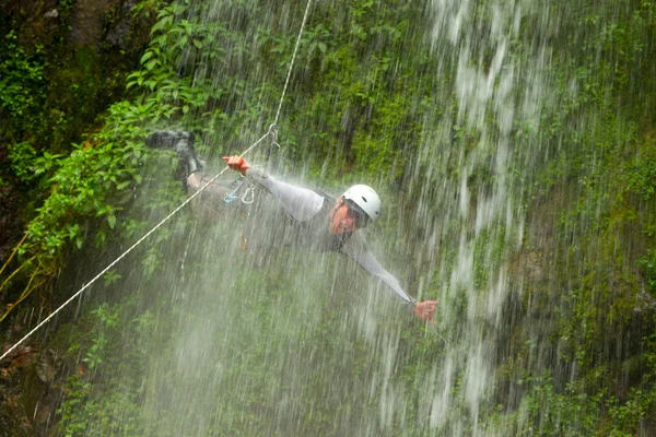 Canyoning Tour Leader Jumping Into A Waterfall — Stok fotoğraf