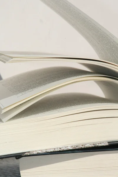 Thick open book on another — Stock Photo, Image