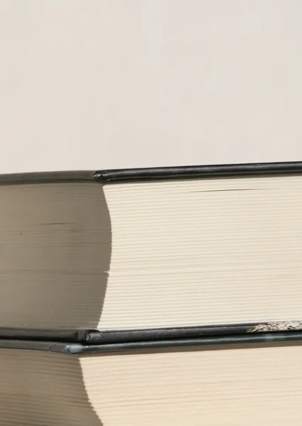 stock image Thick book on another