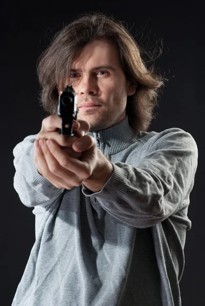 Man holding a gun. — Stock Photo, Image