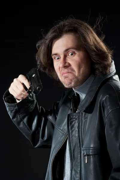 Man pointing a gun — Stock Photo, Image