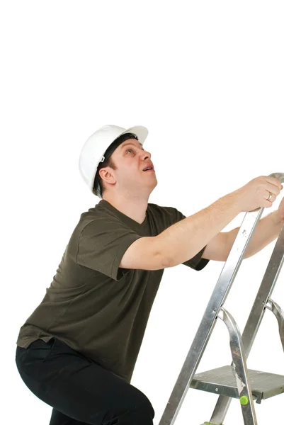 Worker climbing upwards upon ladder Royalty Free Stock Photos