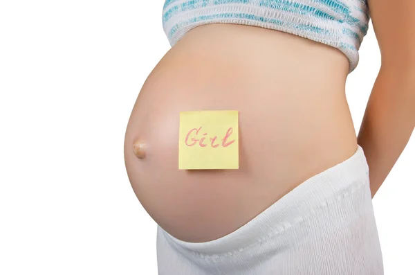 Kobieta w ciąży z karteczkę na brzuchu — Zdjęcie stockowe