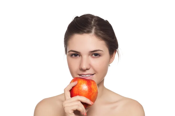 Beautiful brunette with the red apple — Stock Photo, Image